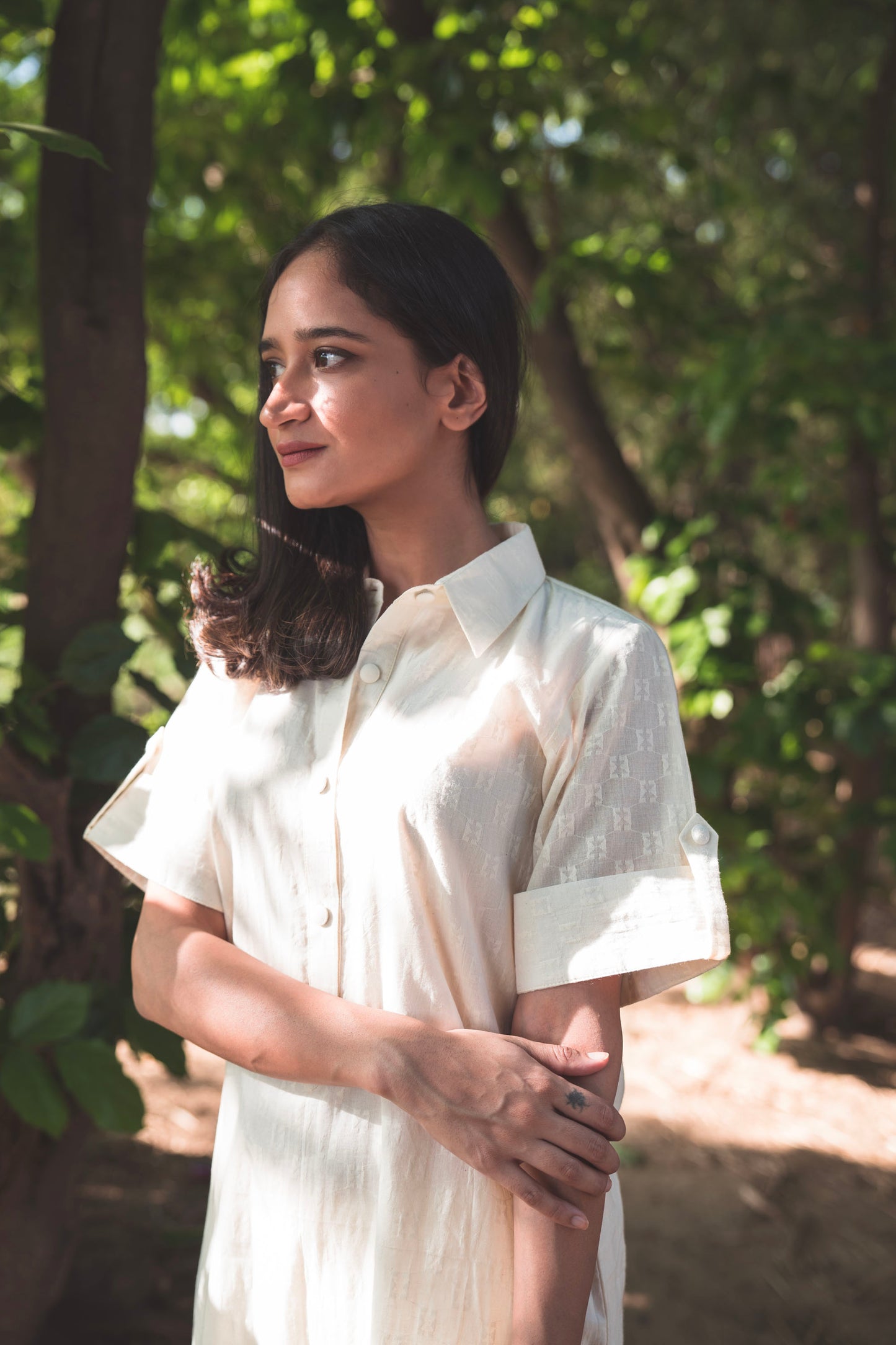 Cream Collared Kurta paired with Rabbit Embroidered Pants