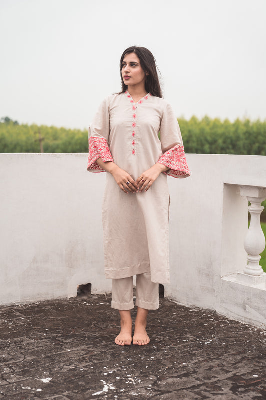 Beige Kurta Set with Embroidered Sleeves in Coral