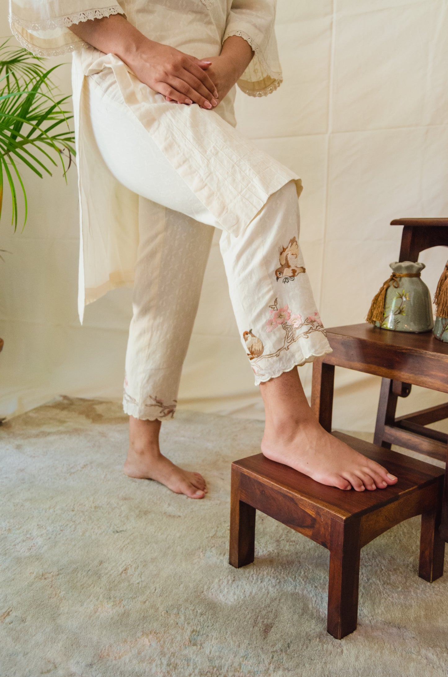 Cream Kurta Set paired with Brown Birds embroidered pants