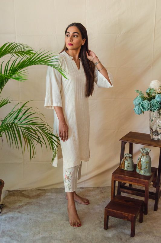 Cream Kurta Set paired with Sparrow embroidered pants